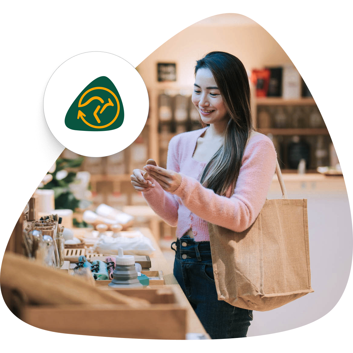 ReMade in Australia logo next to customer smiling while inspecting a product in a store